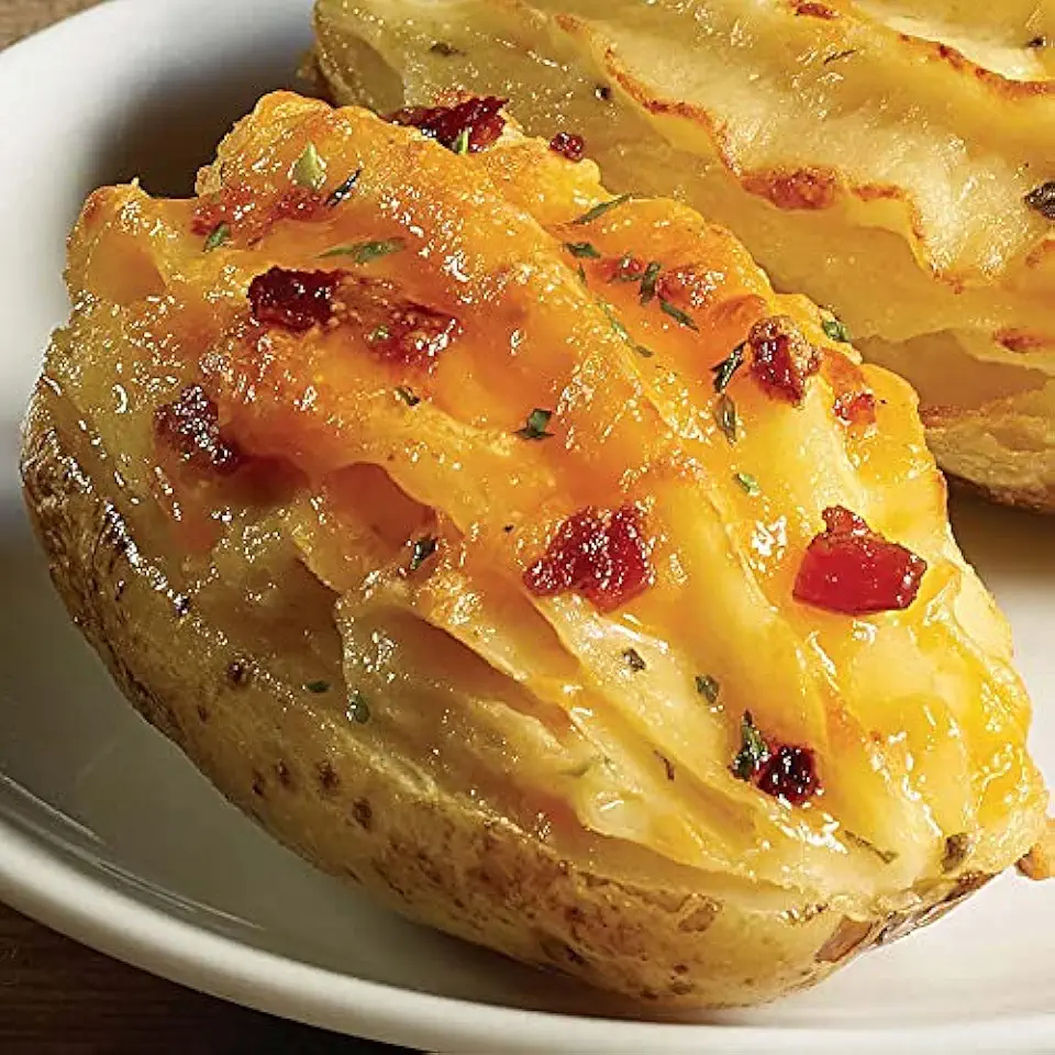 Deliciously Loaded Twice Baked Potatoes, 8-count, 8 oz - Gourmet side dish made with real butter and cheddar cheese. Perfect for steaks, roasts, seafood, and burgers from Kansas City Steak Company.