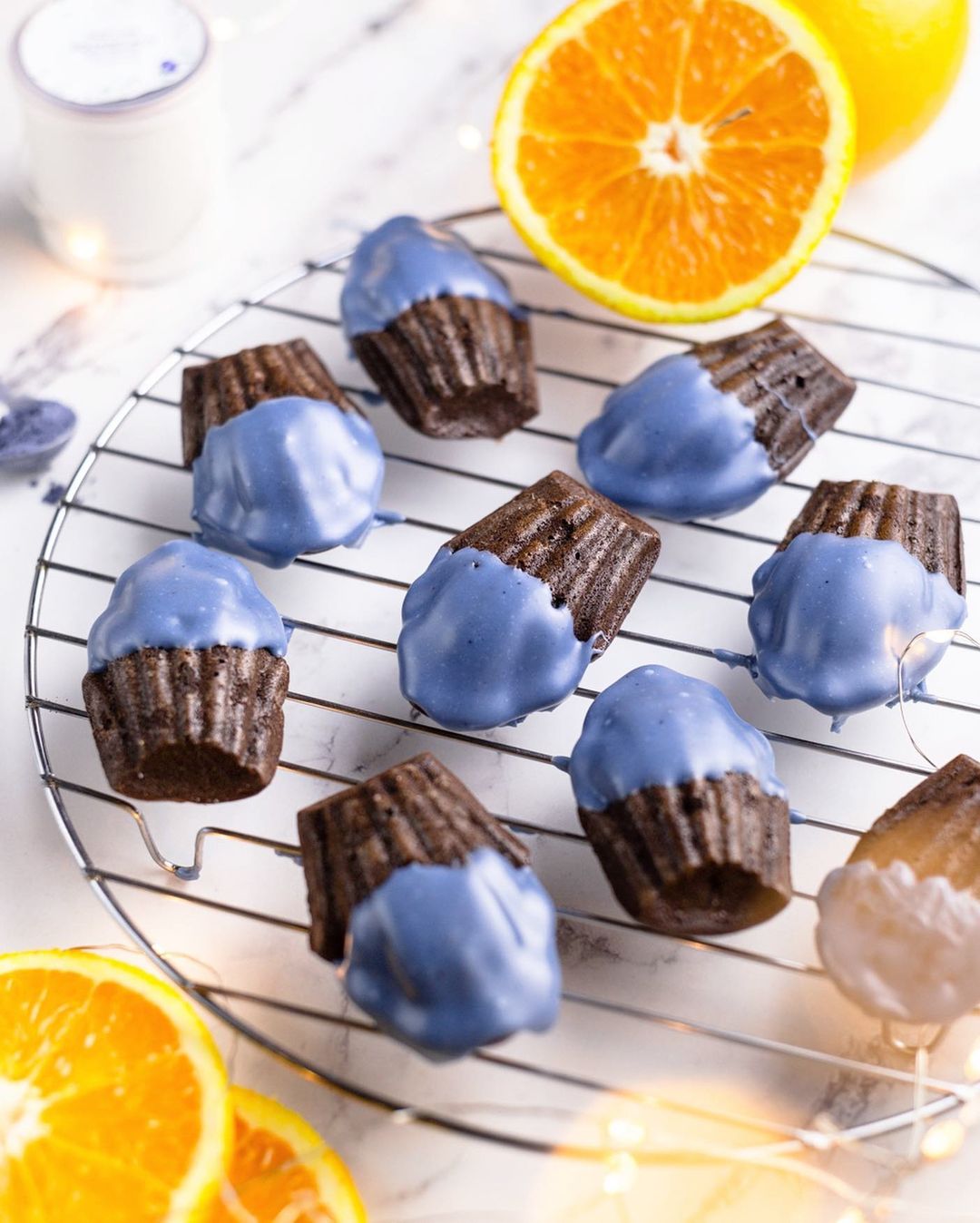Chocolate madeleines with blue matcha