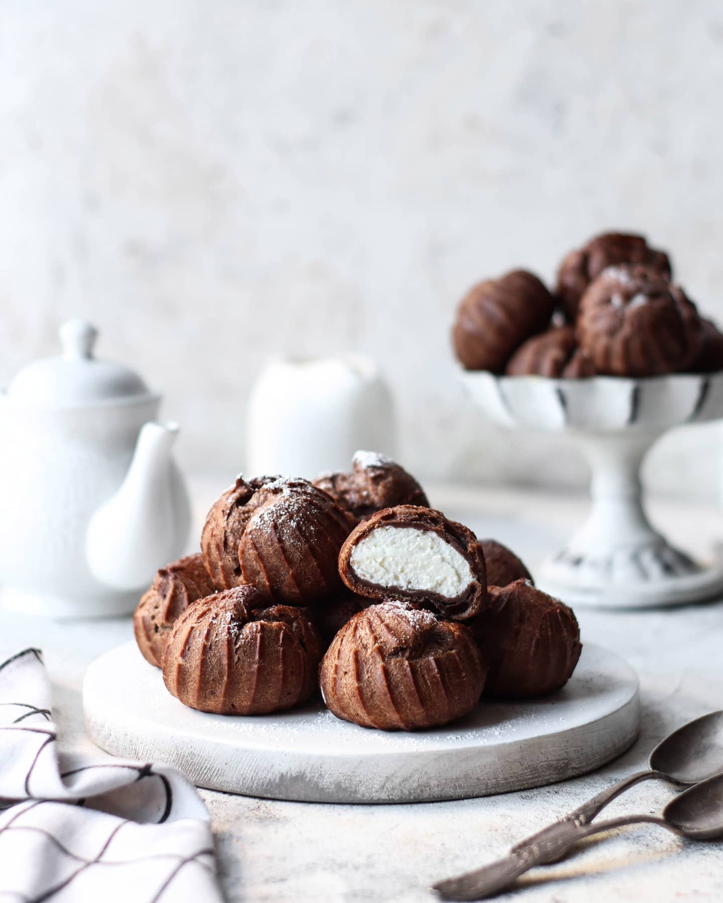 Chocolate profiteroles with whipped cream