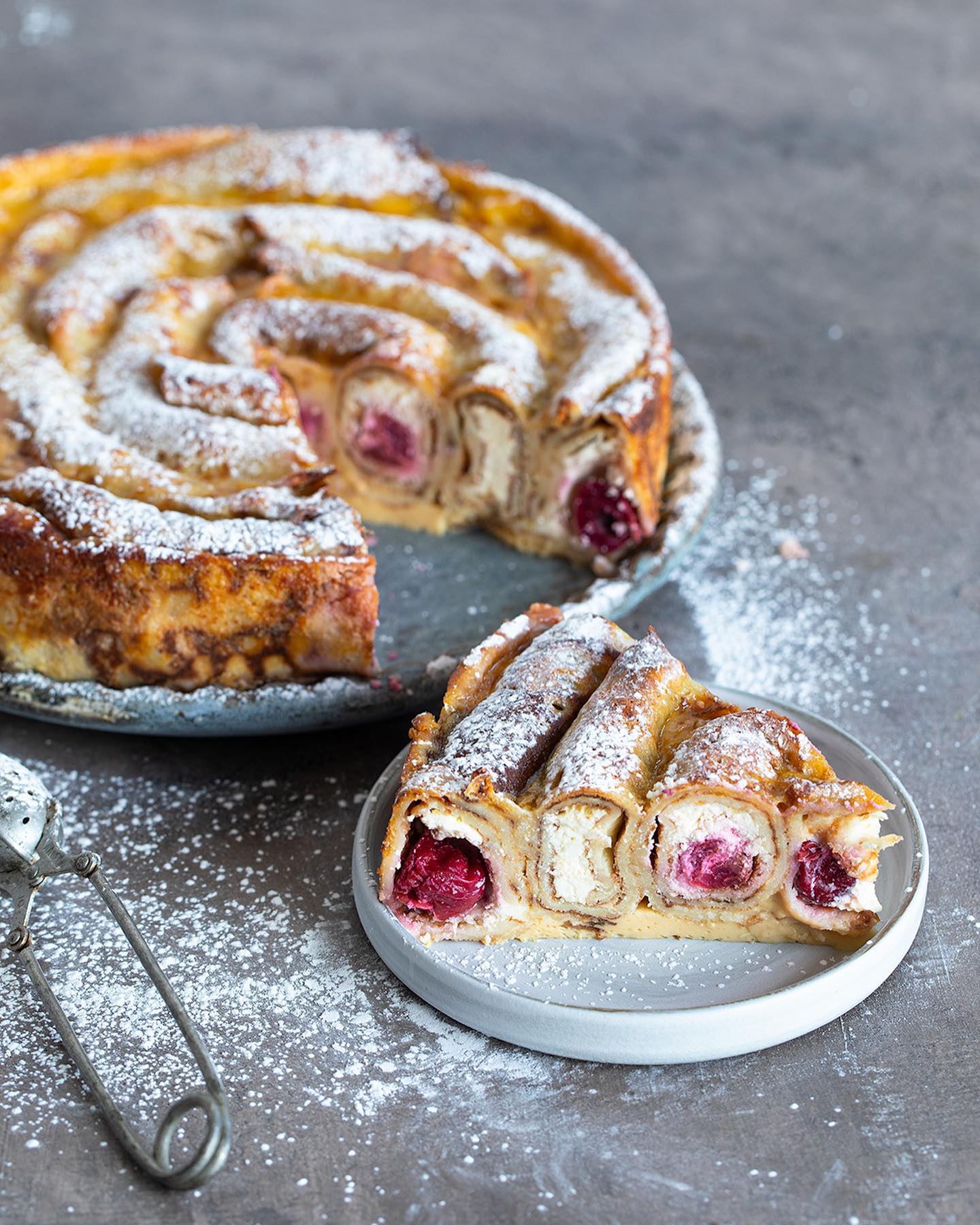 Crepe snail-cake with cottage cheese & cherry