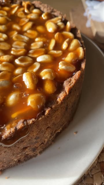 Indulgent Snickers Cheesecake with Caramel Topping