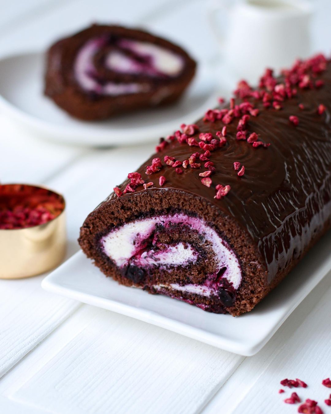 Peerless chocolate swiss roll with berry confit