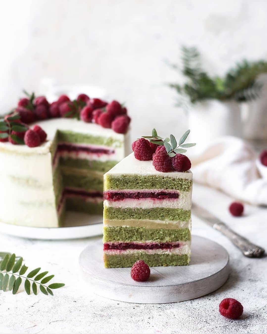 Pistachio cake with raspberry confit and pistachio ganache