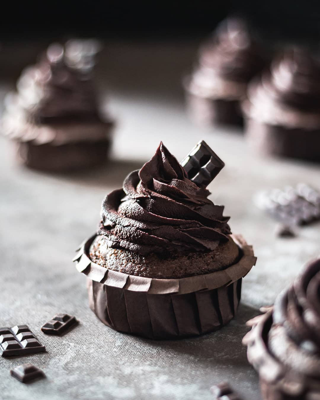 Rich cupcakes with chocolate & berry frosting