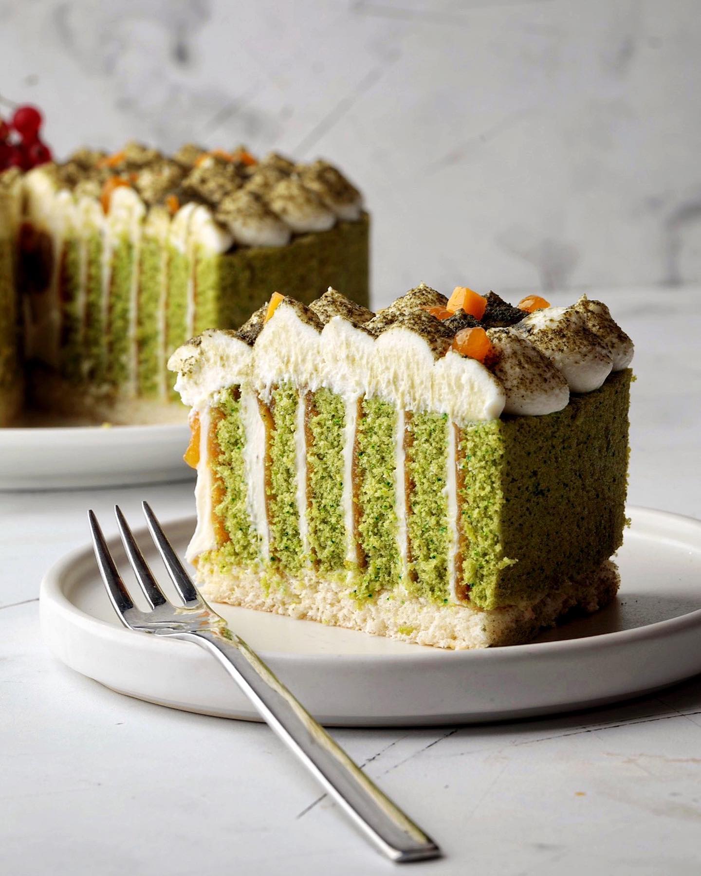 Tall matcha cake with mango confit