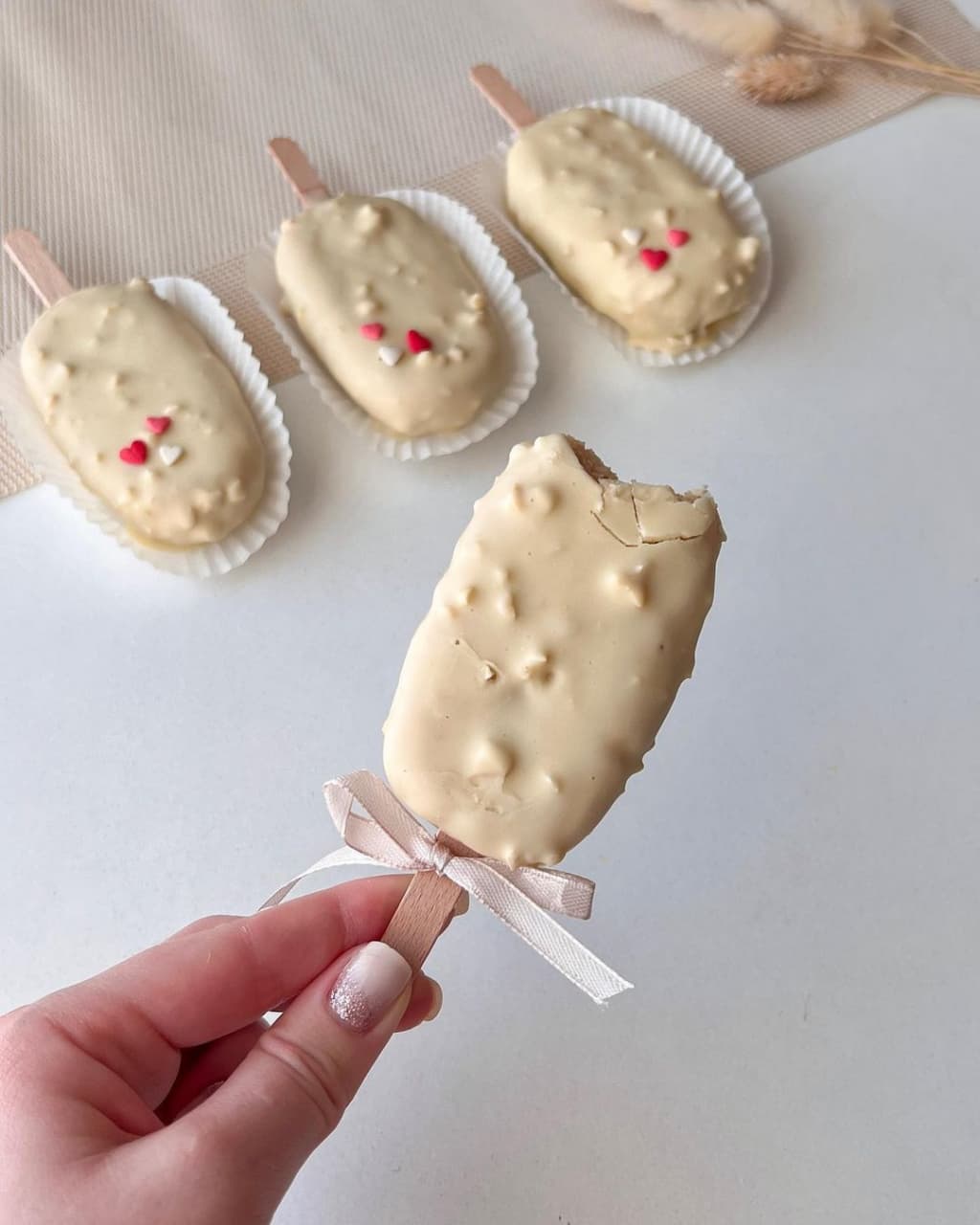 Vanilla cakesicles with white chocolate & nuts
